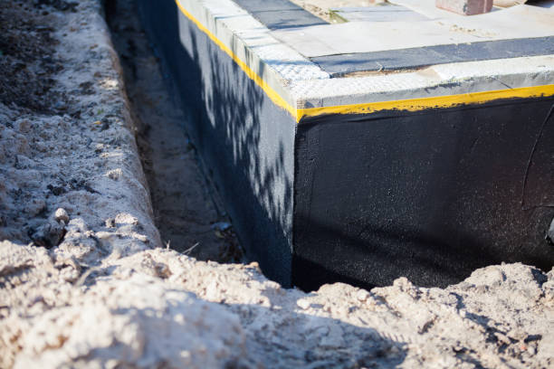 Professional Waterproofing technician working in Burlington, WA